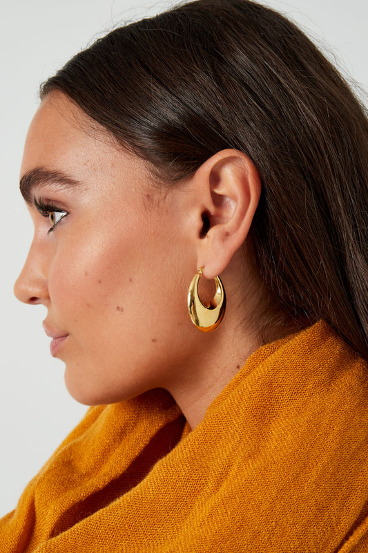 Sierlijke ronde statement oorbellen - goud