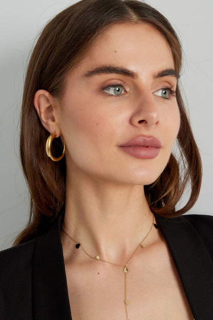 Chique ronde statement oorbellen - goud