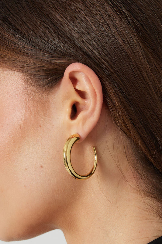 Chique ronde statement oorbellen - goud