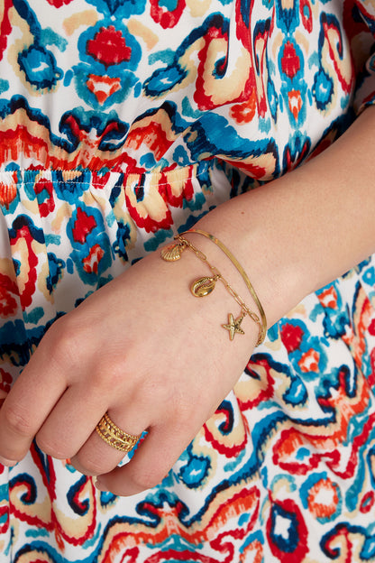 Dubbele armband met zee-bedels - goud