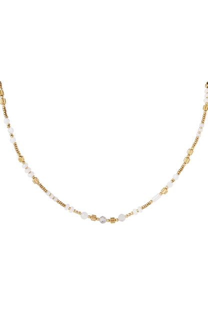 Kralenketting met witte steentjes - goud
