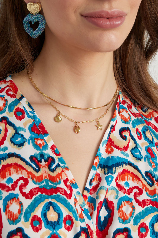 Dubbele ketting met zee bedels - goud