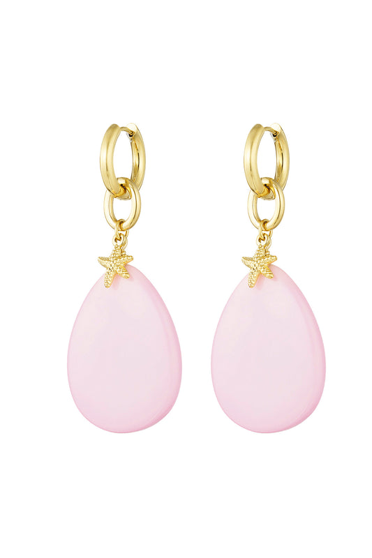 Oorbellen met ovalen hanger en zeester bedel - roze/goud